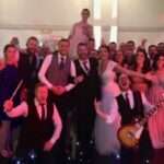 bride and groom with the band and wedding guests balbirnie house 28th dec 2017 wedding the dirty martinis