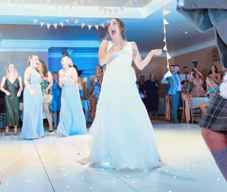 bride throws bouquet fife wedding band the dirty martinis 18th sept 2021 craigsanquhar