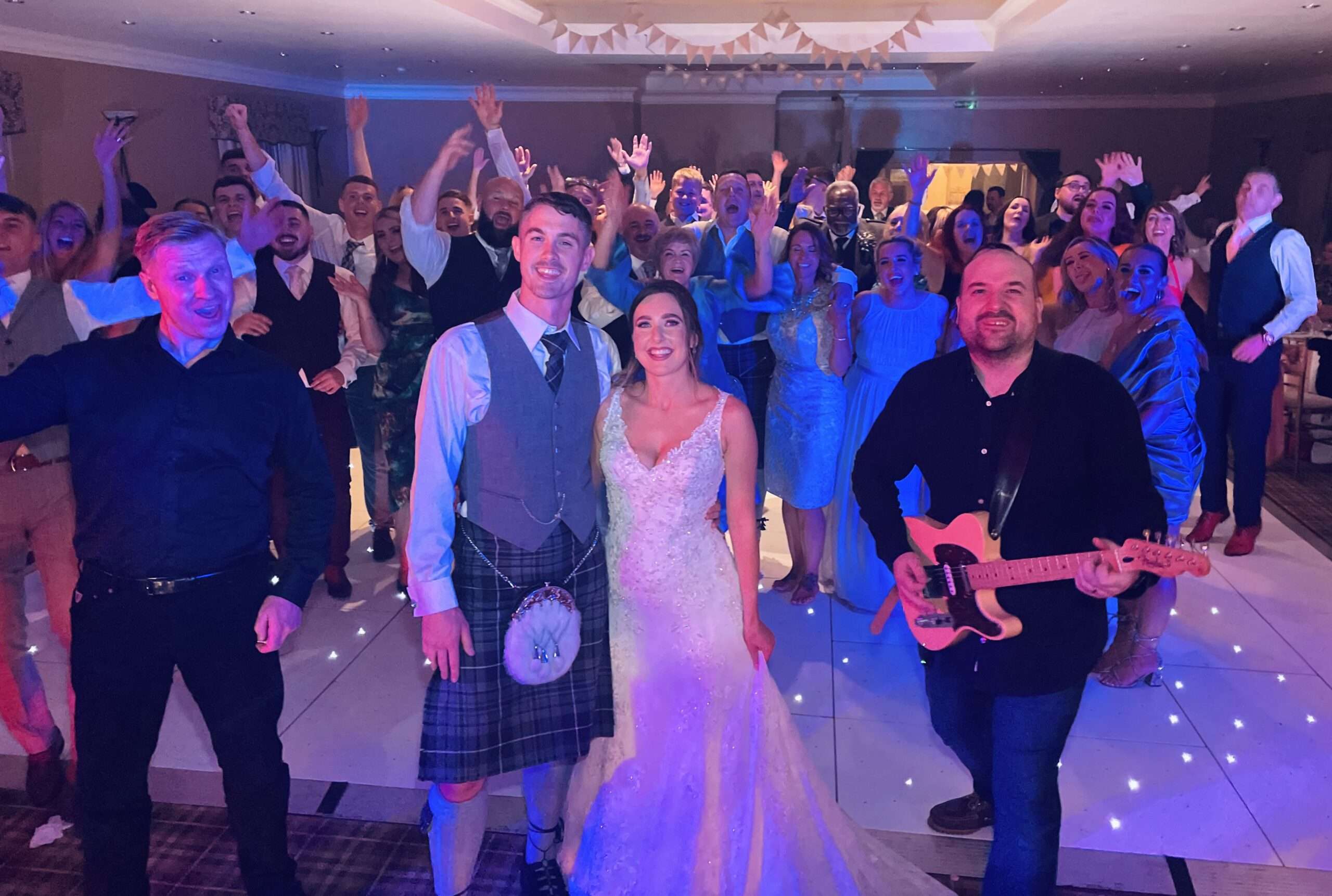 bride and groom with fife best wedding band the dirty martinis 18th sept 2021 craigsanquhar