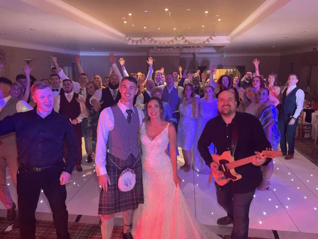fbride and groom with fife best wedding band the dirty martinis 18th sept 2021 craigsanquhar