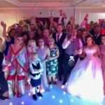 wedding bride and groom guests smiling and happy with fife wedding band the dirty martinis. The Dean Park hotel Kirkcaldy.