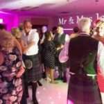 guests dancing with fife's best wedding band the dirty martinis.